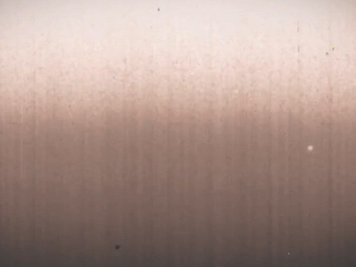 Side B, muted mauve film grain texture
